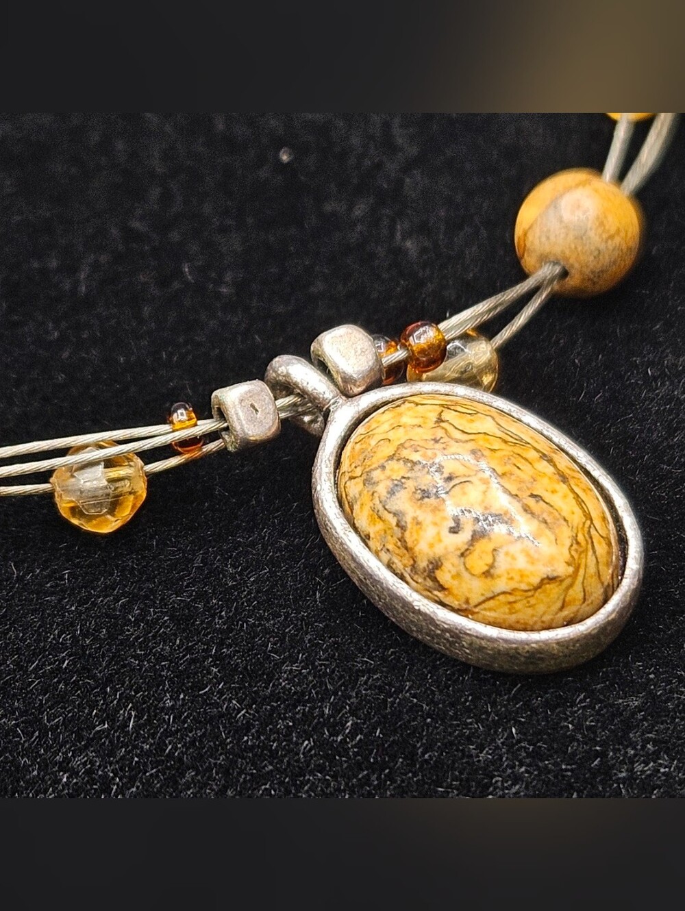 Picture Jasper on three-strand wire necklace features an earthy, bohemian design